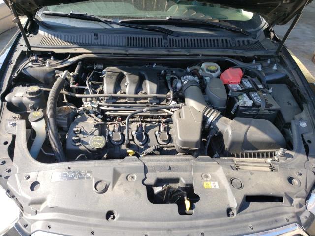 Снимка 11 от търг – 2014 FORD TAURUS SEL с VIN 1FAHP2E87EG158168