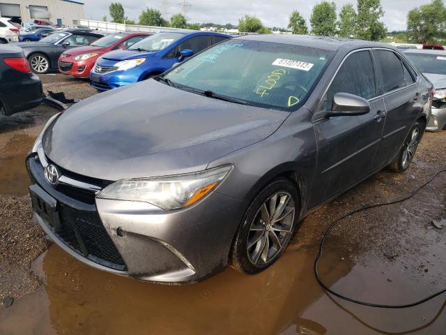 TOYOTA CAMRY LE 2017 with VIN 4T1BF1FK8HU414620 - Photo from auction