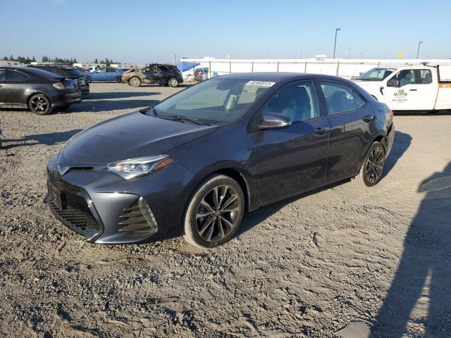 TOYOTA COROLLA L 2019 with VIN 2T1BURHE7KC237949 - Photo from auction