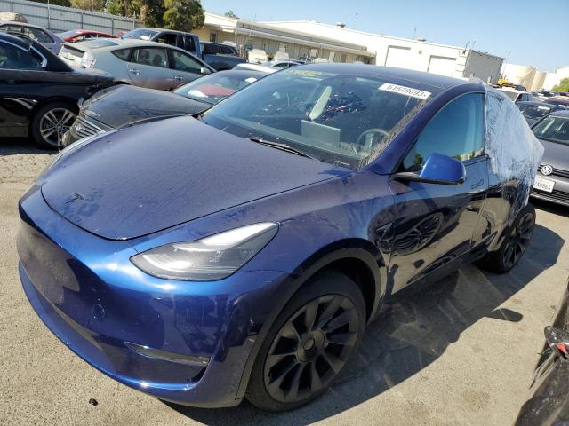 TESLA MODEL Y 2023 with VIN 7SAYGDEE1PF589634 - Photo from auction