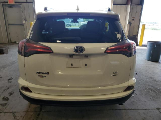 Photo 6 from auction – 2017 TOYOTA RAV4 LE with VIN JTMBFREV1HJ133372