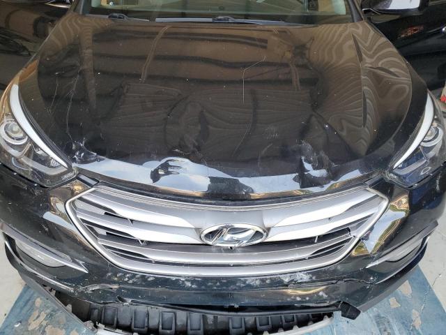 Photo 12 from auction – 2017 HYUNDAI SANTA FE S with VIN 5NMZU3LB2HH016335