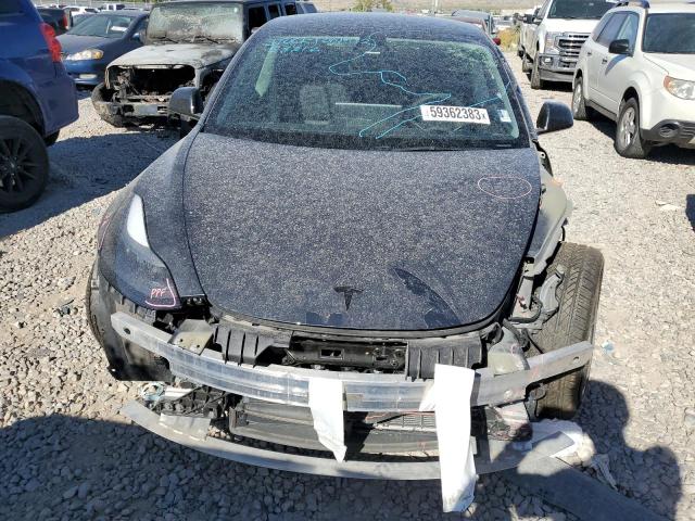 Photo 5 from auction – 2022 TESLA MODEL 3 with VIN 5YJ3E1EB3NF272906