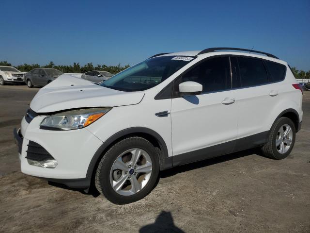 FORD ESCAPE SE 2014 with VIN 1FMCU0GX4EUB99375 - Photo from auction
