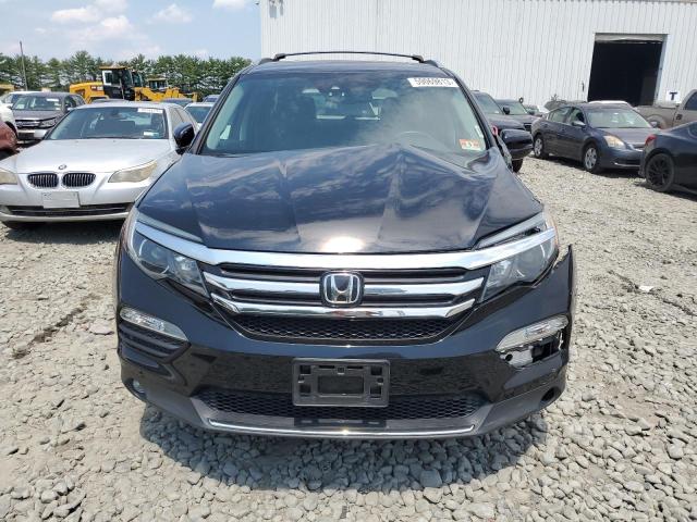 Photo 5 from auction – 2017 HONDA PILOT TOUR with VIN 5FNYF6H95HB054401