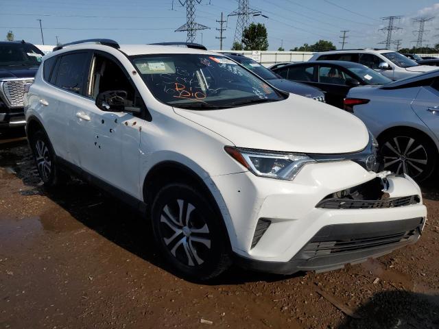 Photo 4 from auction – 2018 TOYOTA RAV4 LE with VIN JTMZFREV5JJ171482