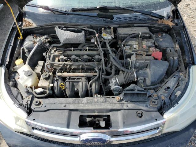 Photo 11 from auction – 2009 FORD FOCUS S with VIN 1FAHP34N99W148296