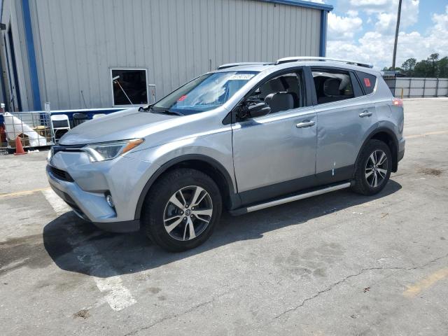 TOYOTA RAV4 XLE 2016 with VIN 2T3WFREV4GW297958 - Photo from auction
