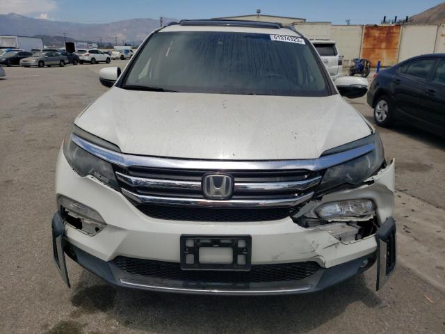 Photo 5 from auction – 2016 HONDA PILOT ELIT with VIN 5FNYF6H00GB059330