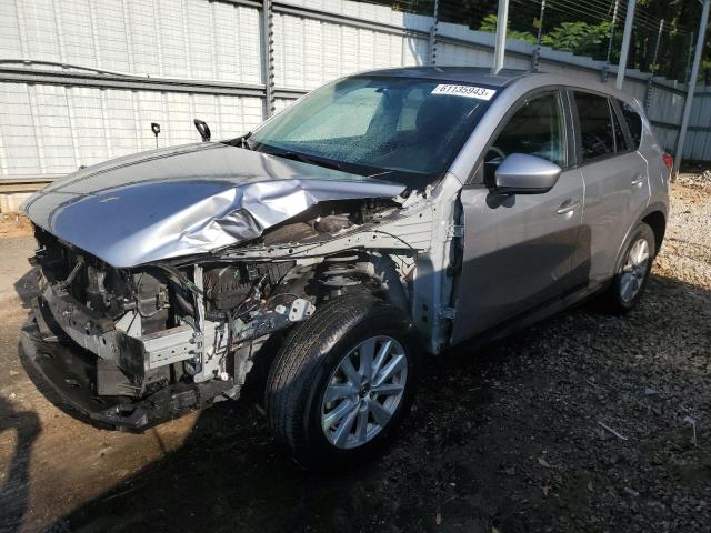 MAZDA CX-5 TOURI 2014 with VIN JM3KE2CY6E0399213 - Photo from auction