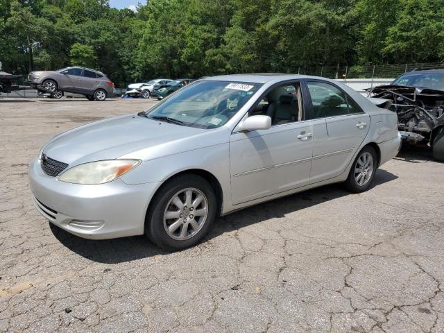 TOYOTA CAMRY LE 2002 with VIN 4T1BE32K82U530489 - Photo from auction