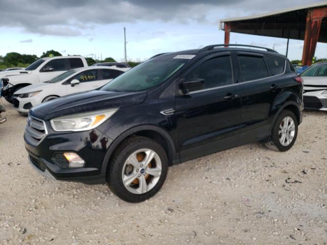 FORD ESCAPE SE 2018 with VIN 1FMCU0GD2JUC36844 - Photo from auction