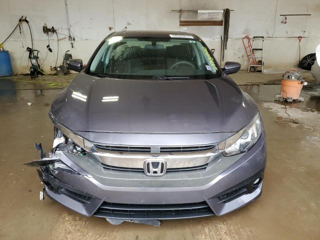 Photo 5 from auction – 2017 HONDA CIVIC EX with VIN 19XFC1F39HE024762