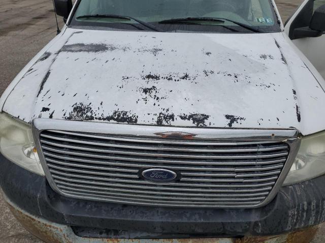 Photo 11 from auction – 2006 FORD F150 with VIN 1FTRF12W06NA86399
