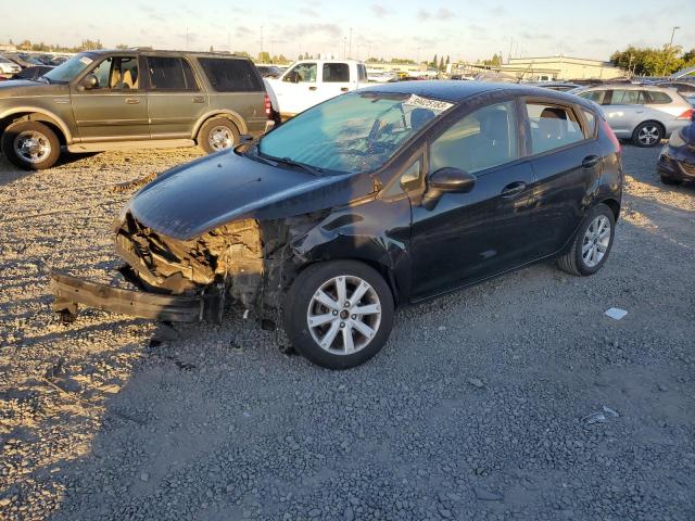 FORD FIESTA SE 2011 with VIN 3FADP4EJ7BM137531 - Photo from auction
