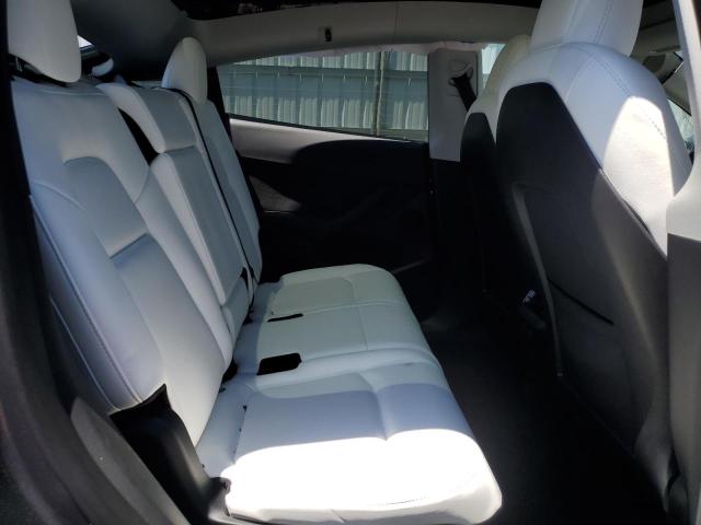 Photo 10 from auction – 2023 TESLA MODEL Y with VIN 7SAYGAEEXPF660554