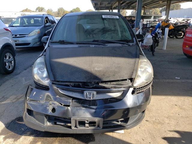 Photo 5 from auction – 2007 HONDA FIT with VIN JHMGD38427S051928