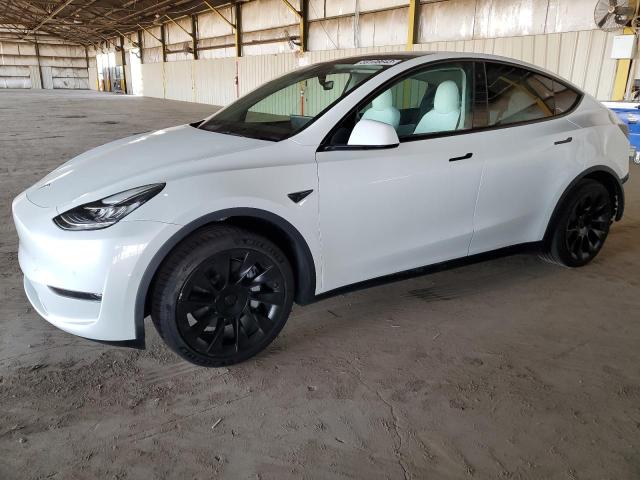 TESLA MODEL Y 2022 with VIN 7SAYGDEE5NF355199 - Photo from auction