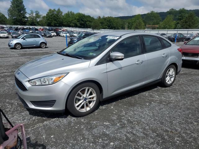 FORD FOCUS SE 2016 with VIN 1FADP3F28GL248695 - Photo from auction