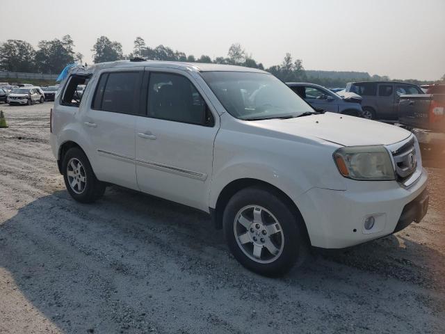 Photo 4 from auction – 2011 HONDA PILOT TOUR with VIN 5FNYF3H9XBB021044