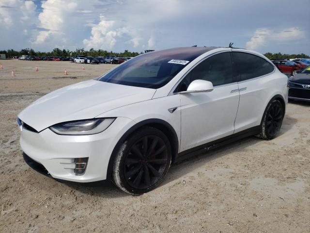 TESLA MODEL X 2018 with VIN 5YJXCAE23JF088373 - Photo from auction