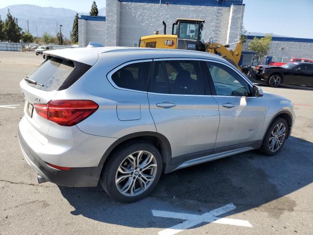 Photo 3 from auction – 2017 BMW X1 XDRIVE2 with VIN WBXHT3Z38H4A54522
