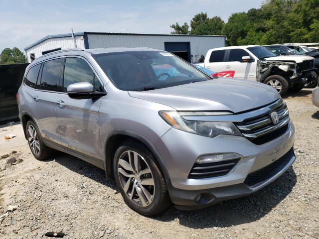 Photo 4 from auction – 2016 HONDA PILOT ELIT with VIN 5FNYF6H06GB091618