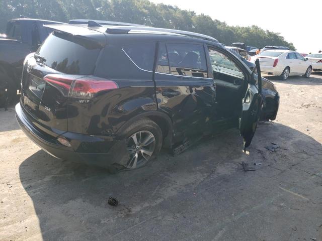 Photo 3 from auction – 2016 TOYOTA RAV4 XLE with VIN 2T3WFREV9GW238176