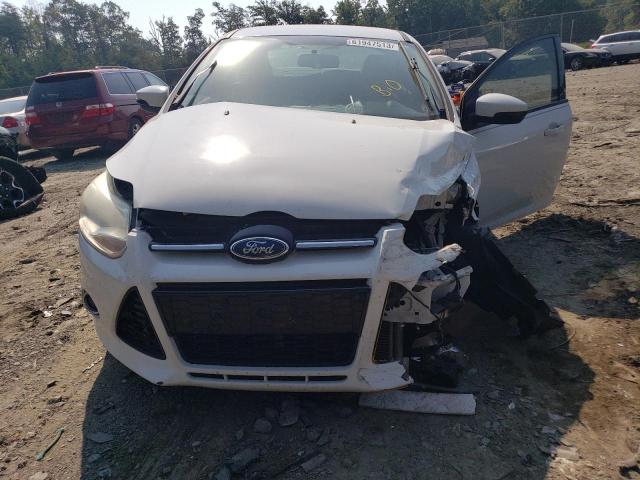 Photo 11 from auction – 2014 FORD FOCUS SE with VIN 1FADP3F21EL296634