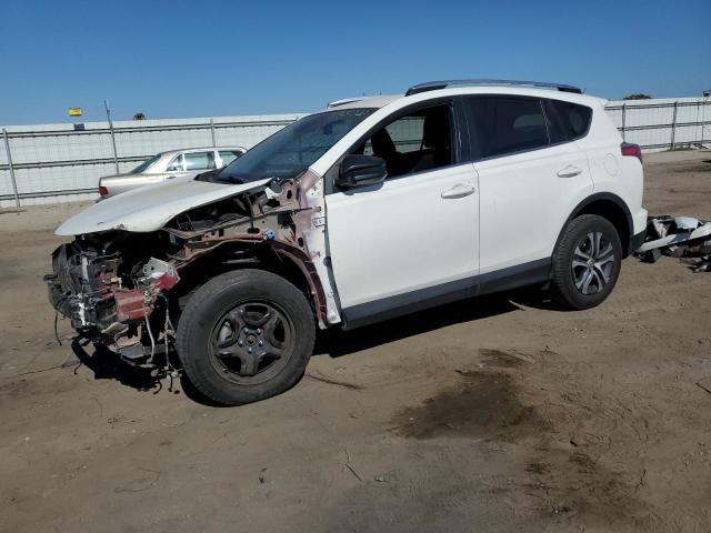 TOYOTA RAV4 LE 2018 with VIN JTMZFREV6JD112892 - Photo from auction