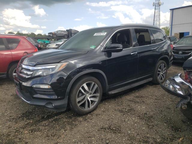 HONDA PILOT TOUR 2016 with VIN 5FNYF6H92GB085782 - Photo from auction