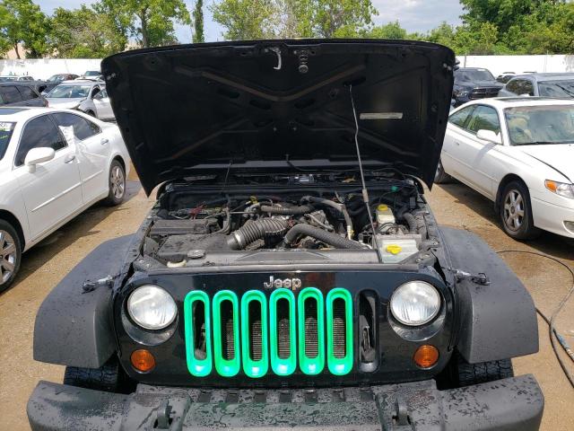 Photo 11 from auction – 2011 JEEP WRANGLER U with VIN 1J4BA3H14BL523540