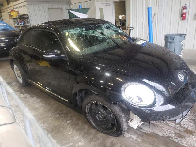 Photo 4 from auction – 2014 VOLKSWAGEN BEETLE with VIN 3VWJX7AT1EM628944