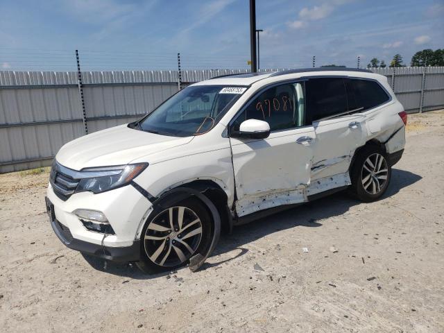 HONDA PILOT TOUR 2017 with VIN 5FNYF6H96HB009418 - Photo from auction
