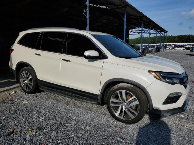 Photo 4 from auction – 2016 HONDA PILOT ELIT with VIN 5FNYF6H06GB088685