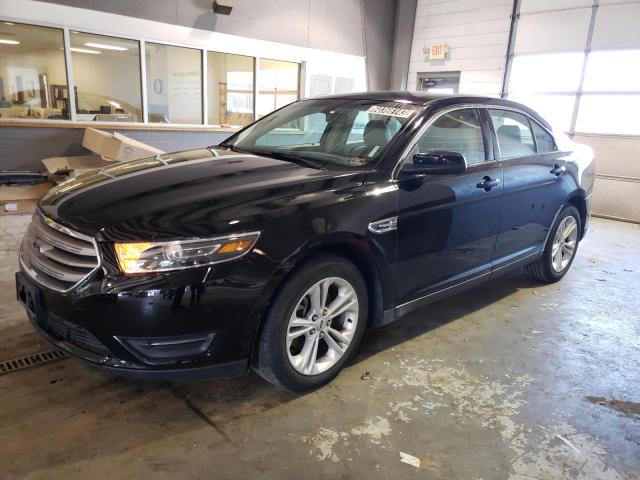 FORD TAURUS SEL 2017 with VIN 1FAHP2E8XHG135990 - Photo from auction