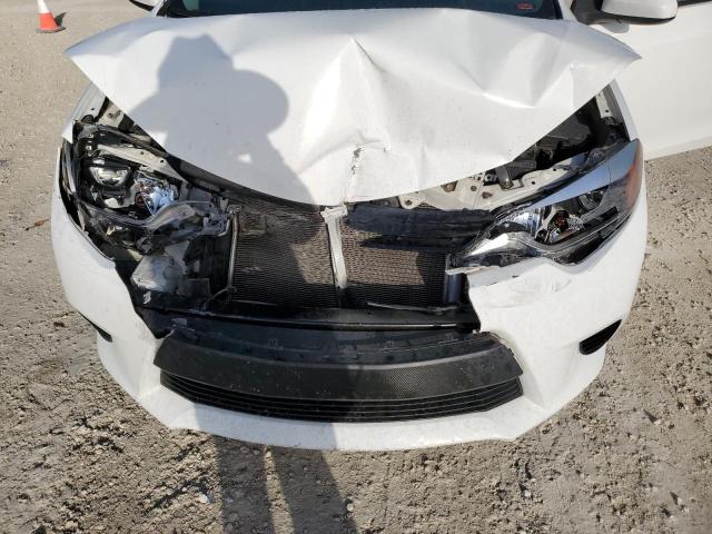 Photo 11 from auction – 2014 TOYOTA COROLLA L with VIN 2T1BURHE2EC039140