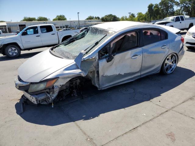 HONDA CIVIC LX 2012 with VIN 2HGFB2F57CH558660 - Photo from auction