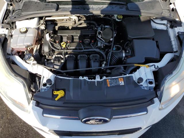 Photo 11 from auction – 2014 FORD FOCUS S with VIN 1FADP3E22EL382147