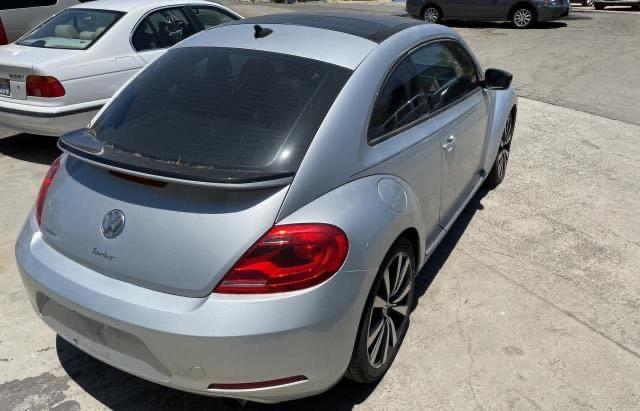 Photo 4 from auction – 2012 VOLKSWAGEN BEETLE TUR with VIN 3VWVA7AT0CM630443