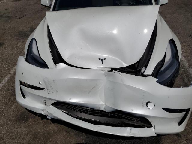 Photo 11 from auction – 2021 TESLA MODEL 3 with VIN 5YJ3E1EA3MF923179