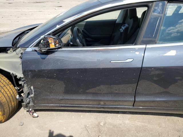 Снимка 7 от търг – 2018 TESLA MODEL 3 с VIN 5YJ3E1EA8JF020134
