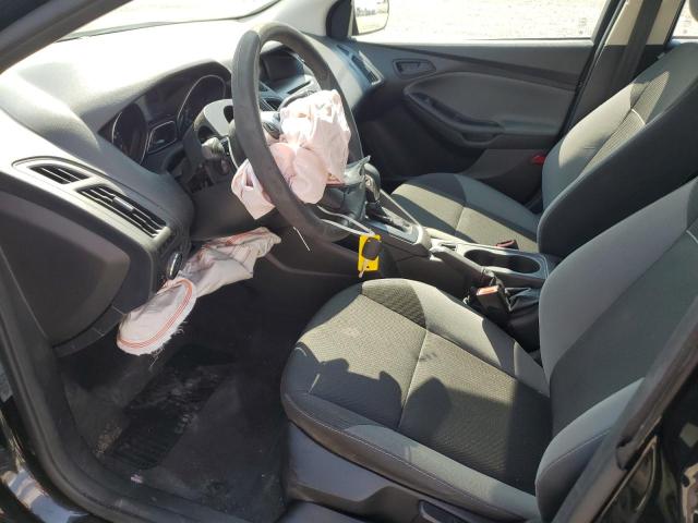 Photo 7 from auction – 2014 FORD FOCUS S with VIN 1FADP3E21EL216427