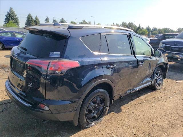 Photo 3 from auction – 2018 TOYOTA RAV4 LE with VIN JTMBFREV1JJ741401