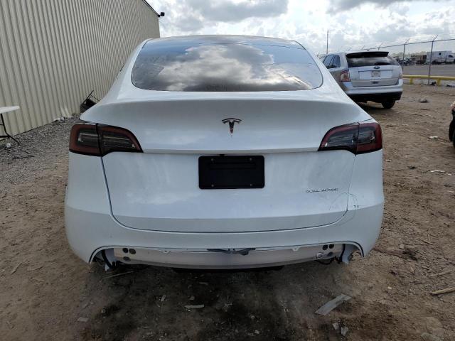 Photo 6 from auction – 2023 TESLA MODEL Y with VIN 7SAYGDEE1PA114000