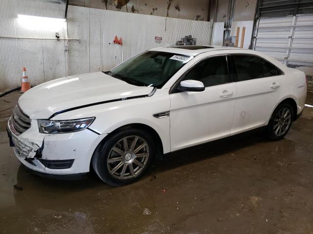 FORD TAURUS SEL 2014 with VIN 1FAHP2E99EG182349 - Photo from auction