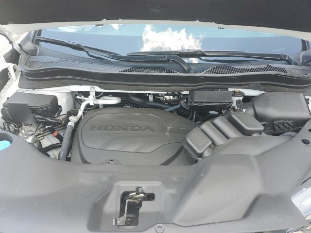 Photo 12 from auction – 2023 HONDA PASSPORT E with VIN 5FNYF8H55PB018165