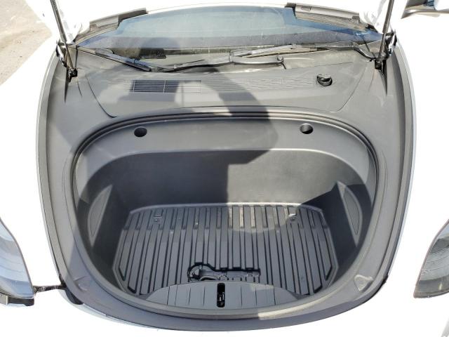 Photo 11 from auction – 2022 TESLA MODEL 3 with VIN 5YJ3E1EA8NF128193