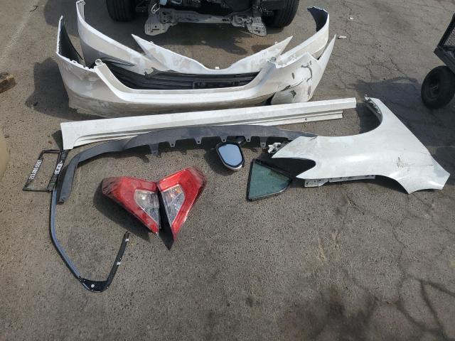 Photo 12 from auction – 2022 TOYOTA CAMRY LE with VIN 4T1C11AK7NU677641