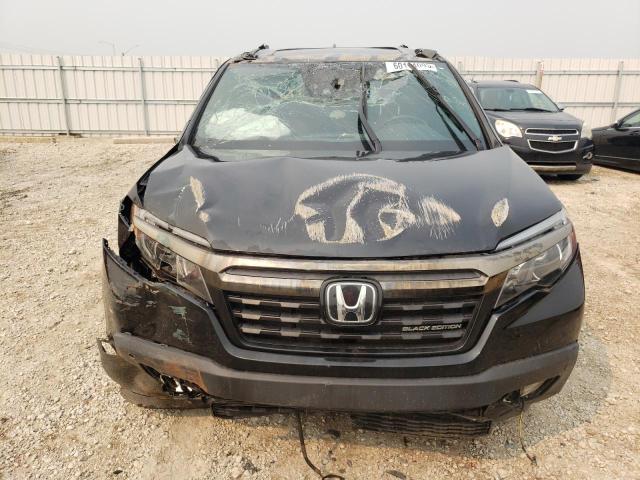 Photo 5 from auction – 2017 HONDA RIDGELINE with VIN 5FPYK3F89HB502795